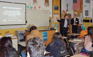 Joel Feldman (L) and Wyatt Johnson speaking to the students at Capital High School in Boise