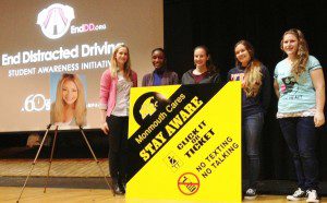 Brooke Burdge (L) with students from Monmouth Regional High School who are involved in efforts to help promote safe driving within their own school community. 