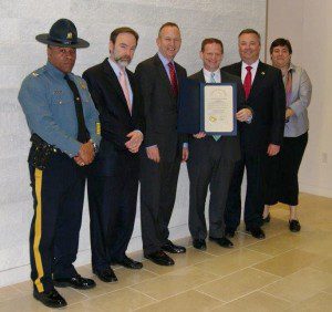  L to R: State Police Superintendent Col. Nathaniel McQueen Jr., Joel Feldman, Governor Jack Markell, Lieutenant Governor Matthew Denn, Tim Lengkeek, President - Delaware Trial Lawyers, Lisa Donofrio, Executive Director, Delaware Trial Lawyers 