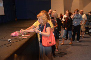 LCPS bus drivers after presentation getting wristbands and brochures