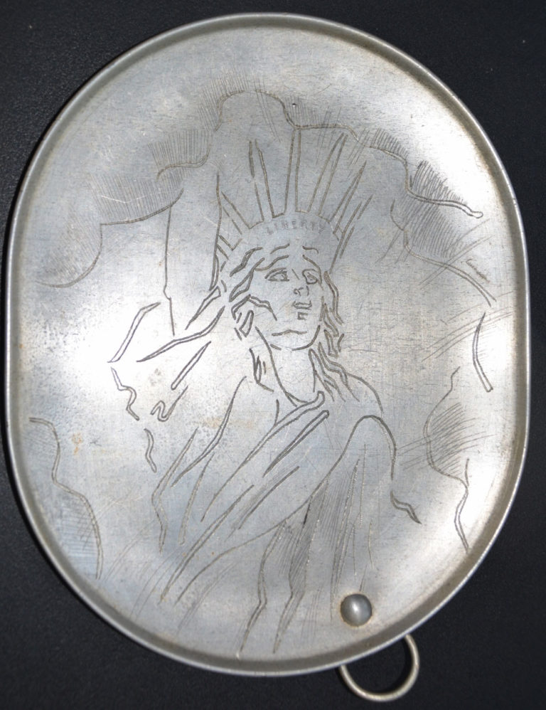 The inside of Grandpa's mess kit lid