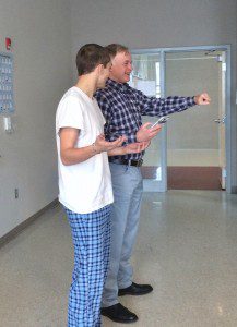Mitch Jensen with Weslake H.S. senior, Sean, during the role-play exercise