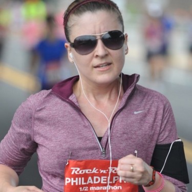 Laura Carney running in the Philadelphia Rock -n-Roll 1/2 Marathon in 2014