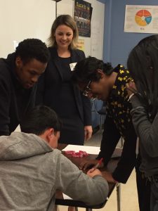 Jen Lipinski working on a cognitive distraction exercise with students at Regan Early College High School