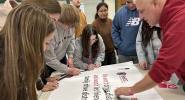 photo at live speaking event about safe driving